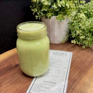 clear mug of light green shake